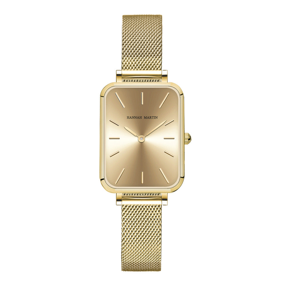 Gold watch with mesh band on a white background